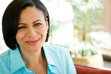 Photo of a smiling woman. Link to Life Stage Gift Planner Under Age 60 Situations.