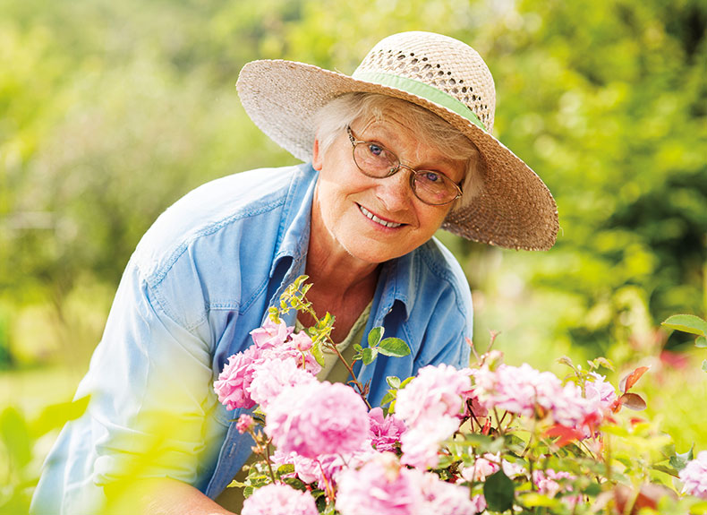 Photo of a woman gardening Link to Life Stage Gift Planner Over Age 70 Situations.